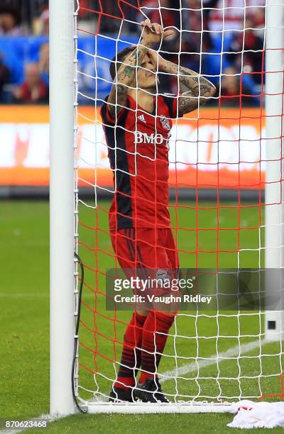 Sebastian Giovinco of Toronto FC reacts after missing a shot on goal during the first half of the MLS Eastern Conference Semifinal, Leg 2 game...