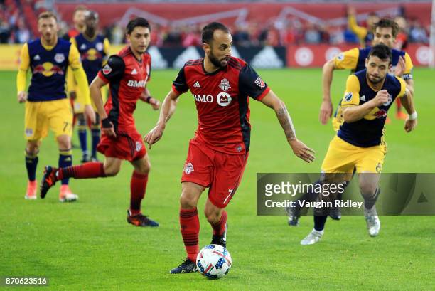 Victor Vazquez of Toronto FC dribbles the ball during the first half of the MLS Eastern Conference Semifinal, Leg 2 game against New York Red Bulls...