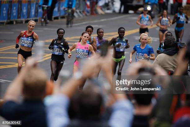 Shalane Flanagan, Mary Jepkosgei Keitany, Sara Dossena and Eva Vrabcova, women's front runners at mile 17, run the 2017 TCS New York City Marathon on...