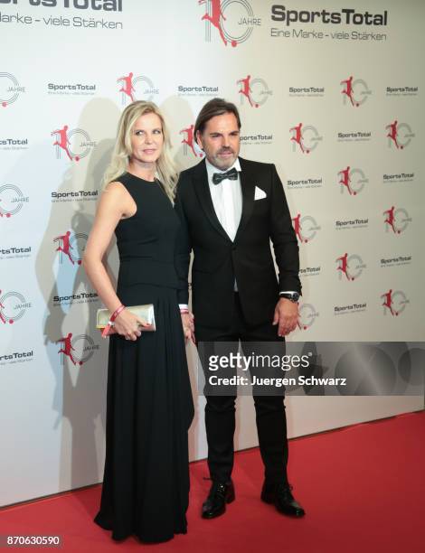 Volker Struth and his girlfriend Melanie pose at the 10th anniversary celebration of the Sports Total Agency on November 5, 2017 in Cologne, Germany.