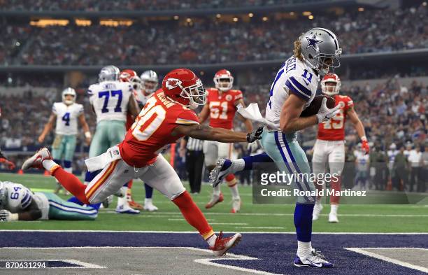 Cole Beasley of the Dallas Cowboys makes a touchdown pass peception against Steven Nelson of the Kansas City Chiefs in the first quarter at AT&T...