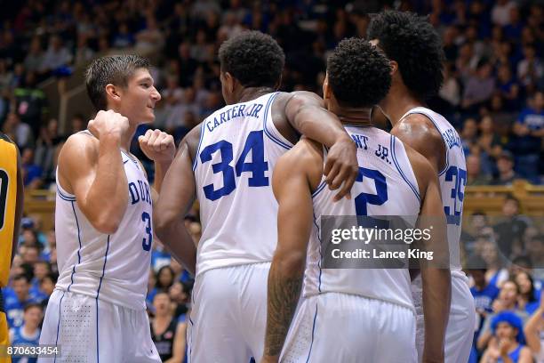 Grayson Allen of the Duke Blue Devils reacts with teammates Wendell Carter, Jr. #34, Gary Trent, Jr. #2 and Marvin Bagley III during their game...