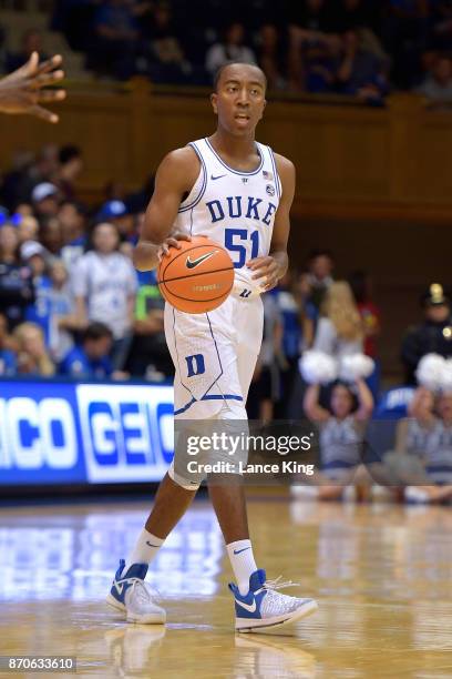 Mike Buckmire of the Duke Blue Devils moves the ball against the Bowie State Bulldogs at Cameron Indoor Stadium on November 4, 2017 in Durham, North...