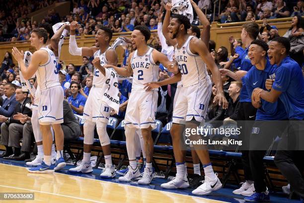 Players of the Duke Blue Devils react from their bench against the Bowie State Bulldogs at Cameron Indoor Stadium on November 4, 2017 in Durham,...