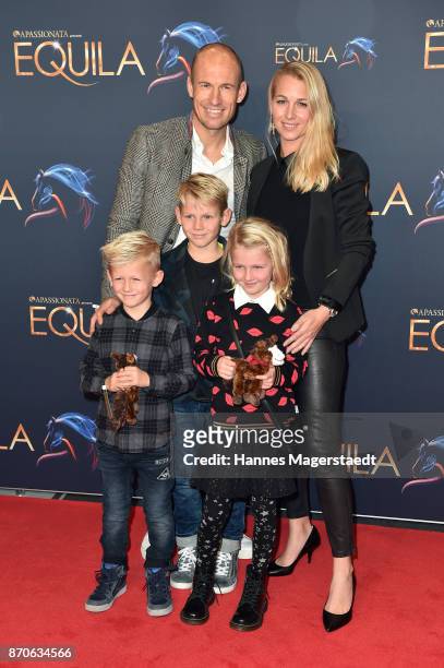 Arjen Robben and his wife Bernadien with their kids Lynn, Luka and Kai during the world premiere of the horse show 'EQUILA' at Apassionata Showpalast...