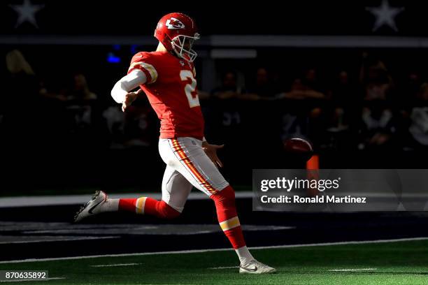 Dustin Colquitt of the Kansas City Chiefs punts against the Dallas Cowboys in the first quater of a football game at AT&T Stadium on November 5, 2017...