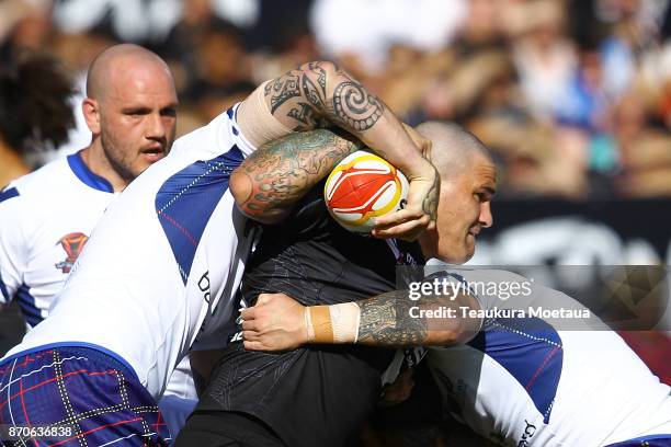 Russell Packer of New Zealand is tackled during the 2017 Rugby League World Cup match between the New Zealand Kiwis and Scotland at AMI Stadium on...