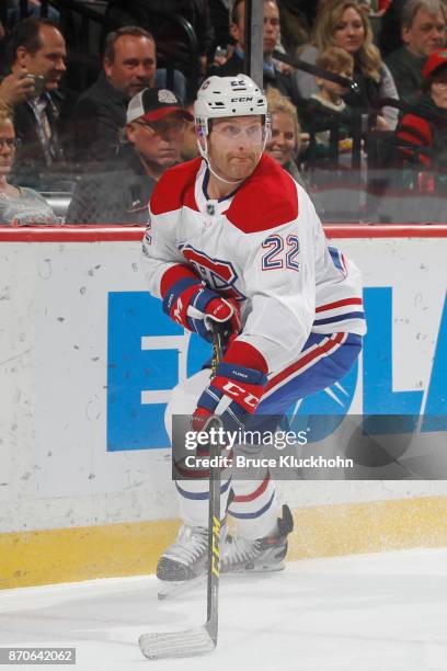 Karl Alzner of the Montreal Canadiens handles the puck against the Minnesota Wild during the game at the Xcel Energy Center on November 2, 2017 in...
