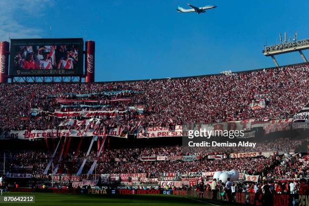 Fans of River Plate cheer their team during a match between River Plate and Boca Juniors as part of the Superliga 2017/18 at Monumental Stadium on...