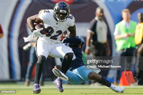 Benjamin Watson of the Baltimore Ravens is tackled against the Tennessee Titans at Nissan Stadium on November 5, 2017 in Nashville, Tennessee.