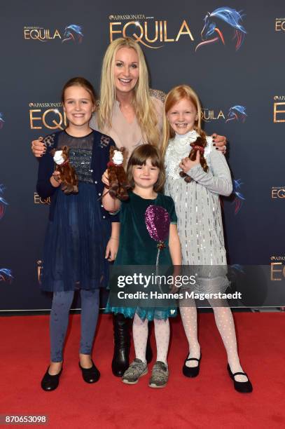 Eva Gruenbauer and her daughters Lisanne and Amelie with a friend during the world premiere of the horse show 'EQUILA' at Apassionata Showpalast...