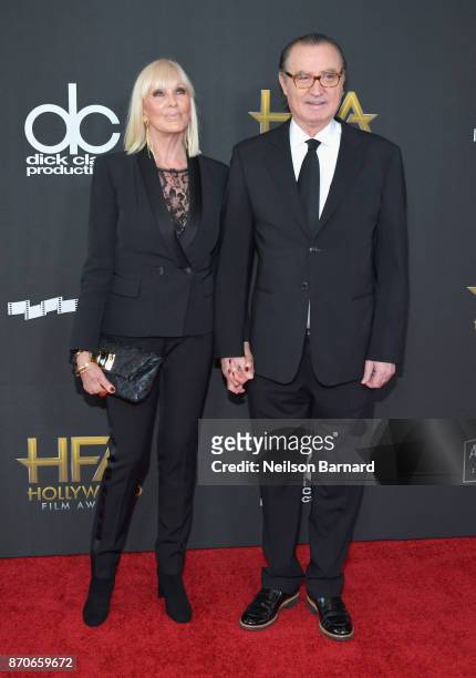 Model Janice Pennington and Hollywood Film Awards founder Carlos de Abreu attend the 21st Annual Hollywood Film Awards at The Beverly Hilton Hotel on...