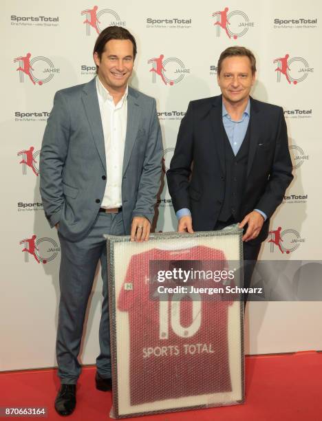 Horst Heldt and Gerhard Zuber pose at the 10th anniversary celebration of the Sports Total Agency on November 5, 2017 in Cologne, Germany.