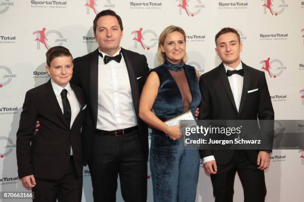 Dirk Hebel poses with his wife and sons at the 10th anniversary celebration of the Sports Total Agency on November 5, 2017 in Cologne, Germany.