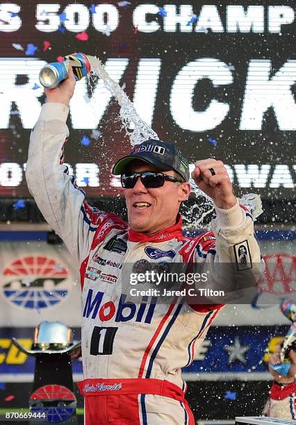 Kevin Harvick, driver of the Mobil 1 Ford, celebrates in Victory Lane after winning the Monster Energy NASCAR Cup Series AAA Texas 500 at Texas Motor...