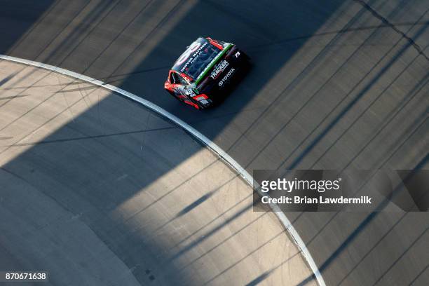Martin Truex Jr. Drives the Bass Pro Shops/Tracker Boats Toyota during the Monster Energy NASCAR Cup Series AAA Texas 500 at Texas Motor Speedway on...