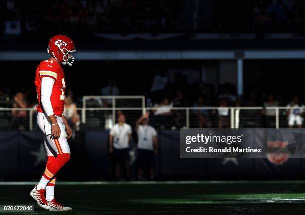 Alex Smith of the Kansas City Chiefs walks onto the field during the second quarter against the Dallas Cowboys at AT&T Stadium on November 5, 2017 in...