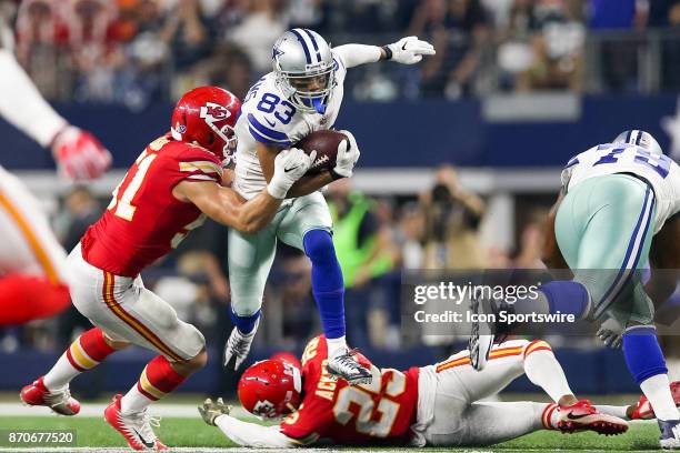 Dallas Cowboys wide receiver Terrance Williams leaps over Kansas City Chiefs cornerback Kenneth Acker during the NFL game between the Kansas City...