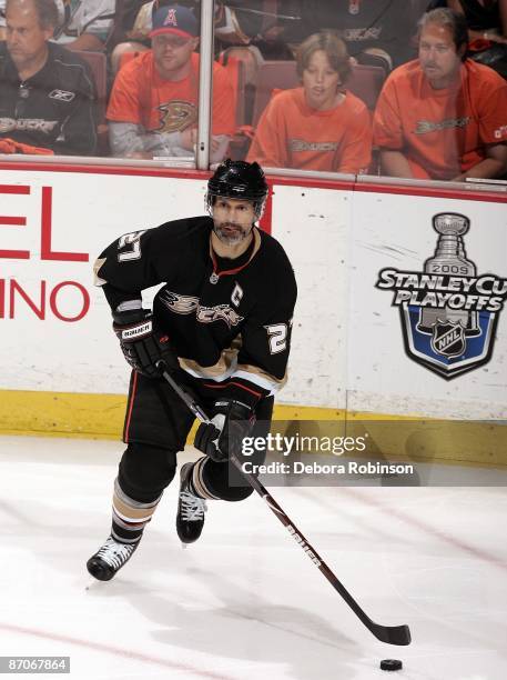 Scott Niedermayer of the Anaheim Ducks handles the puck against the Detroit Red Wings during Game Four of the Western Conference Semifinals Round of...