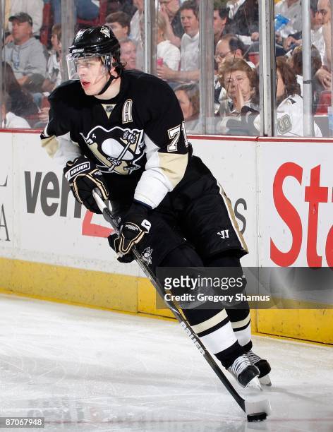 Evgeni Malkin of the Pittsburgh Penguins controls the puck against the Washington Capitals during Game Four of the Eastern Conference Semifinals of...