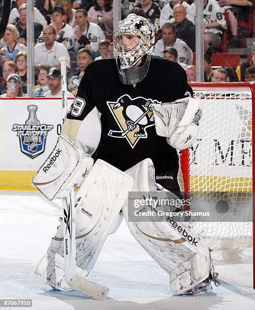 Marc-Andre Fleury of the Pittsburgh Penguins looks on against the Washington Capitals during Game Four of the Eastern Conference Semifinals of the...