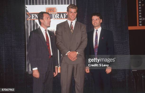 Canadian ice hockey player Eric Lindros poses following his first round, first place selection by the Quebec Nordiques in the NHL Entry Draft at...