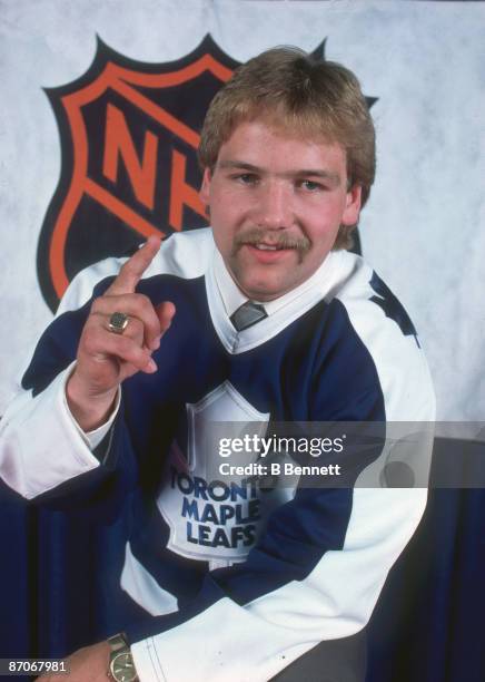 Portrait of Canadian ice hockey player Wendel Clark in the jersey of the Toronto Maple Leafs, following his first round, first place selection in the...