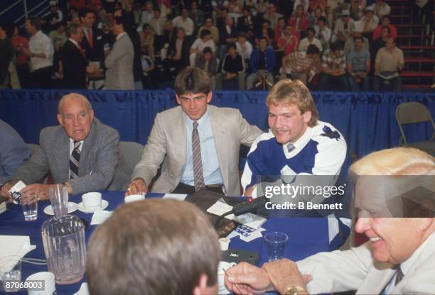 Canadian ice hockey player Rick Vaive of the Toronto Maple Leafs poses with his team's first round, first place draft pick, player Wendel Clark in...