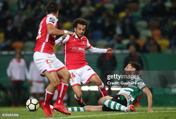 Braga forward Fabio Martins from Portugal with Sporting CP defender Andre Pinto from Portugal in action during the Primeira Liga match between...