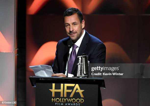 Honoree Adam Sandler accepts the Hollywood Comedy Award for 'The Meyerowitz Stories' onstage during the 21st Annual Hollywood Film Awards at The...