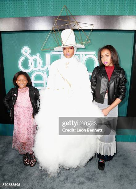 Mars Merkaba Thedford, host Erykah Badu, and Puma Sabti Curry attend the 2017 Soul Train Awards, presented by BET, at the Orleans Arena on November...