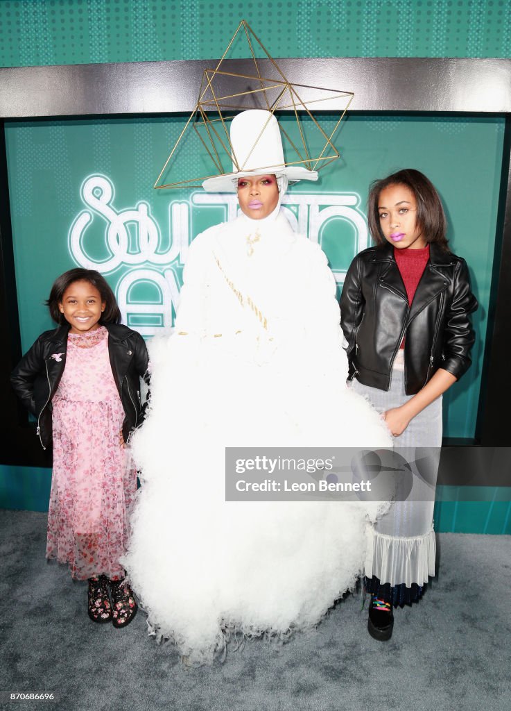 Mars Merkaba Thedford, host Erykah Badu, and Puma Sabti Curry