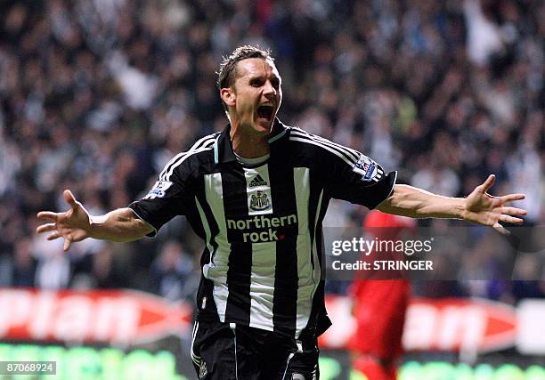 Newcastle United's Peter Lovenkrands celebrates scoring the third goal as they beat Middlesbrough 3-1 in their English Premier League football match...