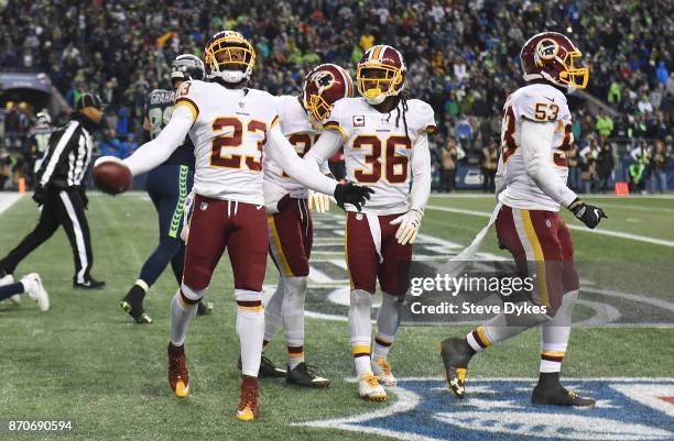 Free safety DeAngelo Hall of the Washington Redskins throws the ball into the stands after breaking up a last-second pass in the game against the...