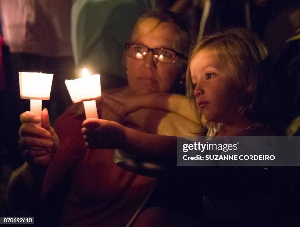 Candlelight vigil is observed on November 5 following the mass shooting at the First Baptist Church in Sutherland Springs, Texas, that left 26 people...