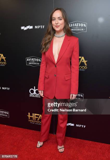 Actor Dakota Johnson poses in the press room during the 21st Annual Hollywood Film Awards at The Beverly Hilton Hotel on November 5, 2017 in Beverly...