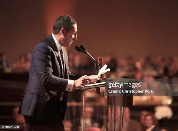 Honoree Adam Sandler accepts the Hollywood Comedy Award for 'The Meyerowitz Stories' onstage during the 21st Annual Hollywood Film Awards at The...