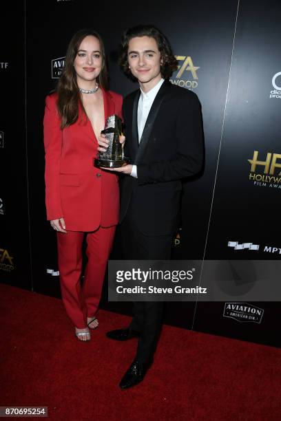 Actor Dakota Johnson poses with honoree Timothee Chalamet, recipient of the Hollywood Breakout Performance Actor Award for 'Call Me By Your Name,' in...