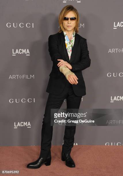 Yoshiki arrives at the 2017 LACMA Art + Film Gala honoring Mark Bradford and George Lucas at LACMA on November 4, 2017 in Los Angeles, California.