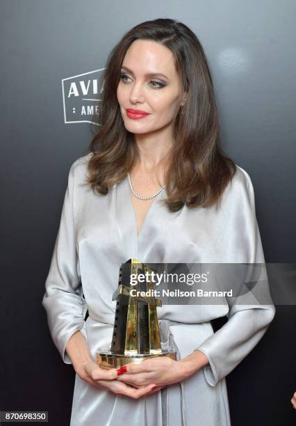 Honoree Angelina Jolie, co-recipient of the Hollywood Foreign Language Film Award for 'First They Killed My Father,' poses in the press room during...