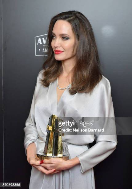 Honoree Angelina Jolie, co-recipient of the Hollywood Foreign Language Film Award for 'First They Killed My Father,' poses in the press room during...