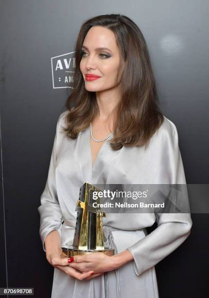 Honoree Angelina Jolie, co-recipient of the Hollywood Foreign Language Film Award for 'First They Killed My Father,' poses in the press room during...
