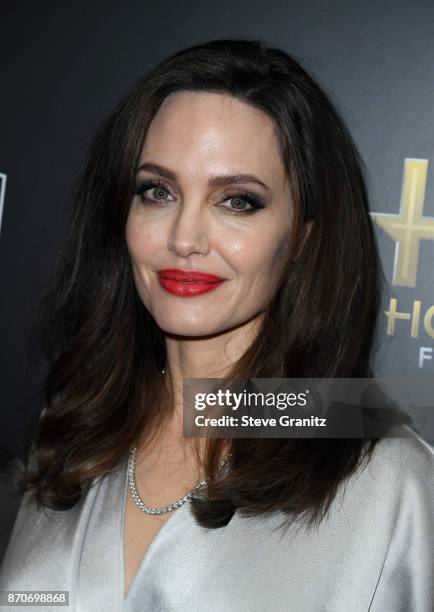 Honoree Angelina Jolie, recipient of the Hollywood Foreign Language Film Award for 'First They Killed My Father,' poses in the press room during the...