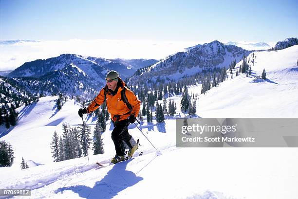 man hiking in the backcountry in utah. - alta utah stock pictures, royalty-free photos & images