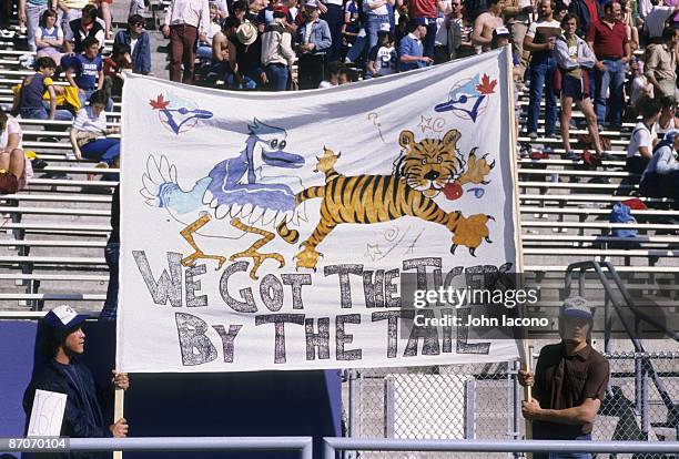 View of fans with WE GOT THE TIGERS BY THE TAIL sign during Toronto Blue Jays vs Cleveland Indians. Toronto, Canada 5/25/1984 CREDIT: John Iacono