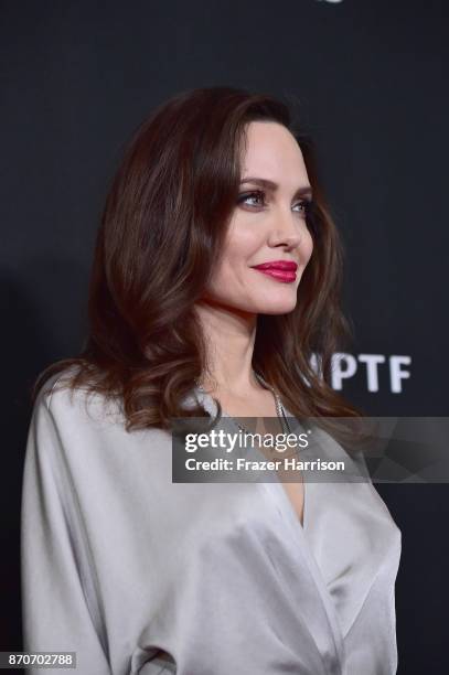 Honoree Angelina Jolie, recipient of the Hollywood Foreign Language Film Award for 'First They Killed My Father,' poses in the press room during the...