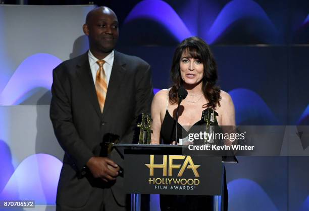 Honorees Broderick Johnson and Cynthia Sikes Yorkin accept the Hollywood Producer Award for 'Blade Runner 2049' onstage at the 21st Annual Hollywood...