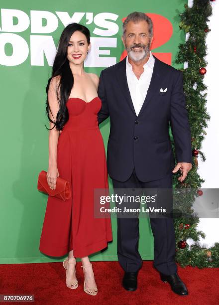 Actor Mel Gibson and Rosalind Ross attend the premiere of "Daddy's Home 2" at Regency Village Theatre on November 5, 2017 in Westwood, California.