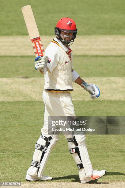 Callum Ferguson of South Australia celebrates his half century during day three of the Sheffield Shield match between Victoria and South Australia at...