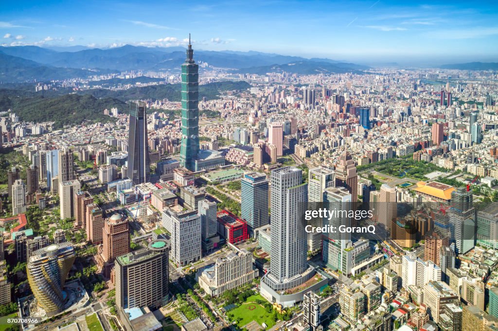 Skyscrapers of a modern city with overlooking perspective under blue sky in Taipei, Taiwan